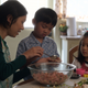 Angela Lin, Kai To, and Sophia Xu in Little America